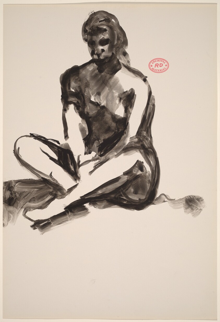 Untitled [female model seated with crossed legs]