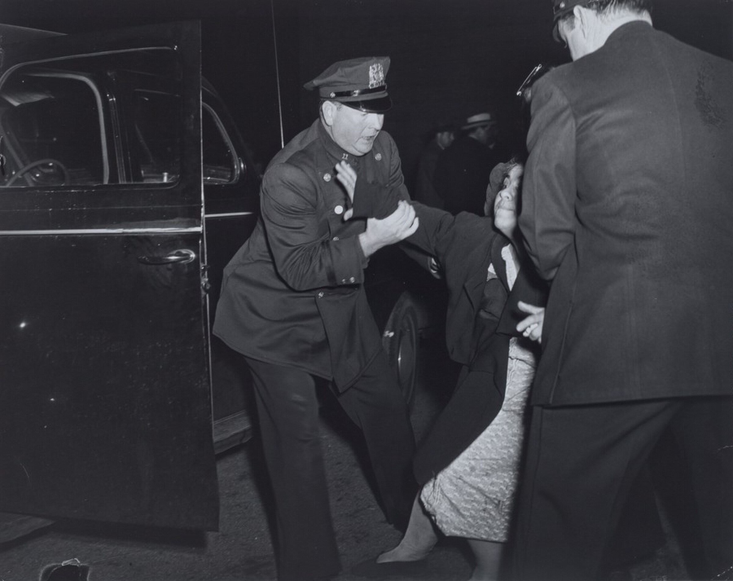 The Dead Man's Wife Arrived and Then She Collapsed, Weegee, c. 1940
