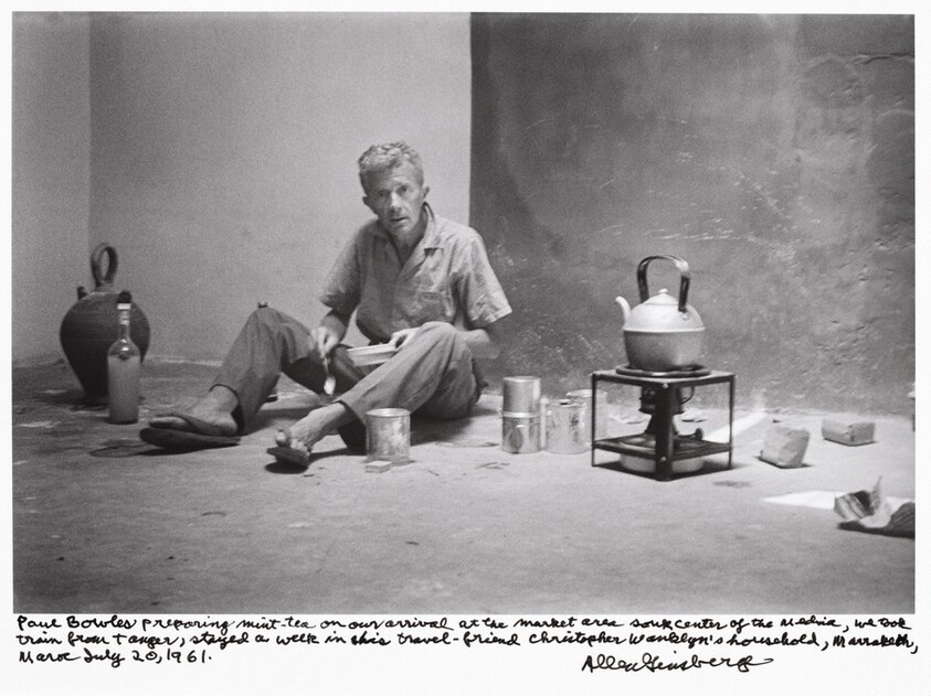 Paul Bowles preparing mint tea on our arrival at the market area souk center of the medina, we took train from Tangier, stayed a week in his travel friend Christopher Wanklyn's household, Marrakech, Morocco, July 20, 1961