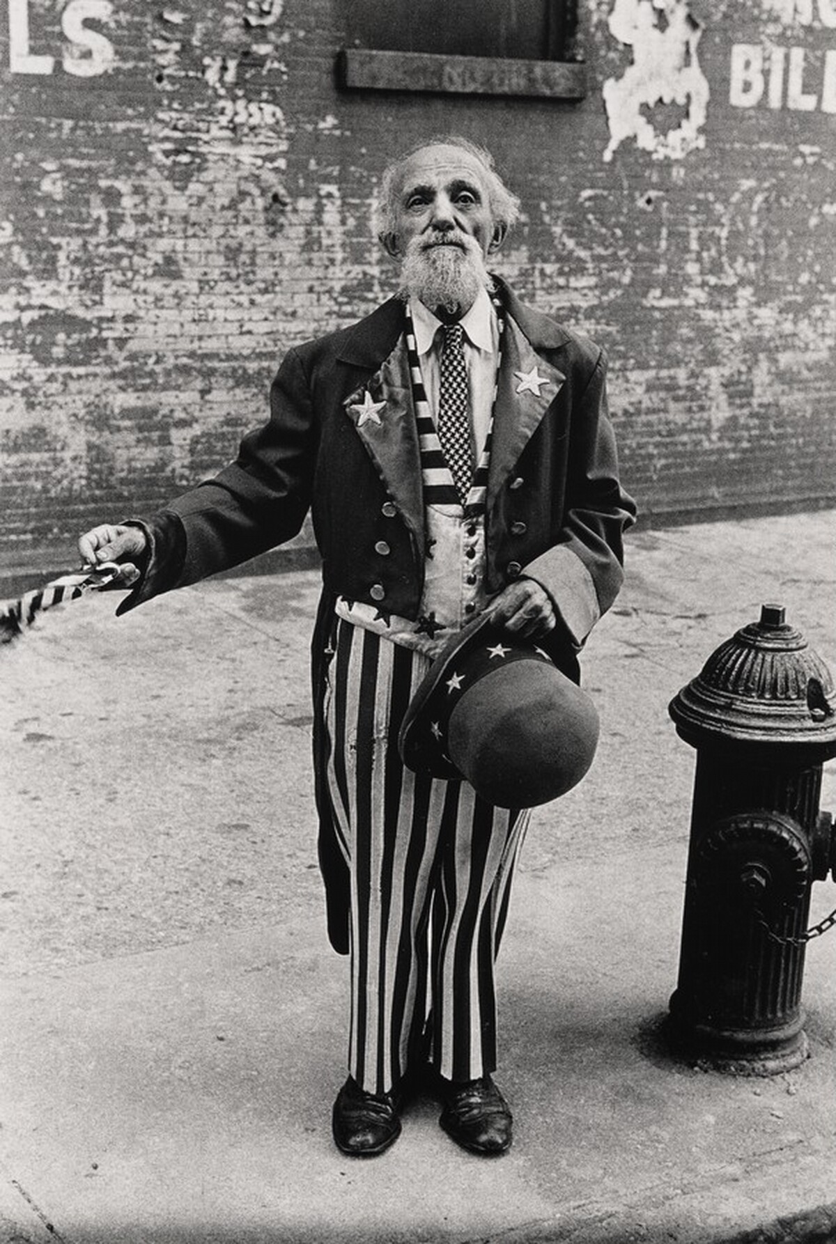 Uncle Sam with his hat off beside a hydrant, N.Y.C. 1961