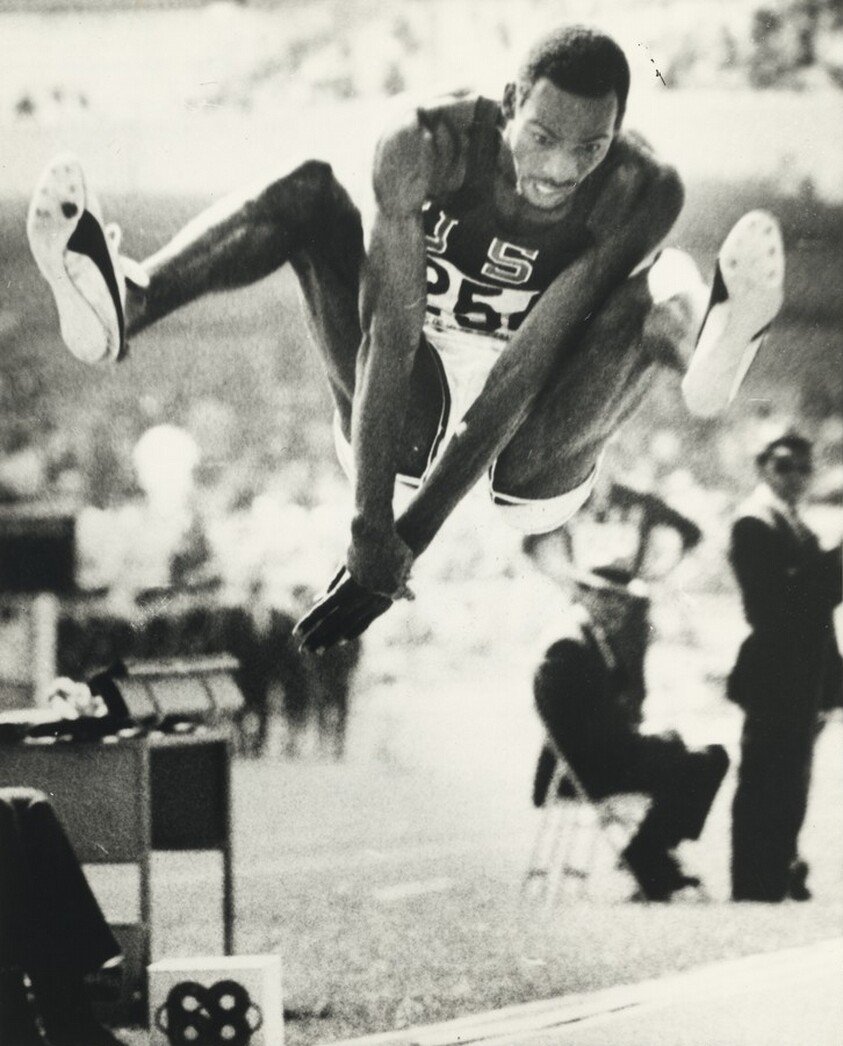 Title from caption on object: “Bob Beamon Sets New World Record in Olympic Broad Jump”