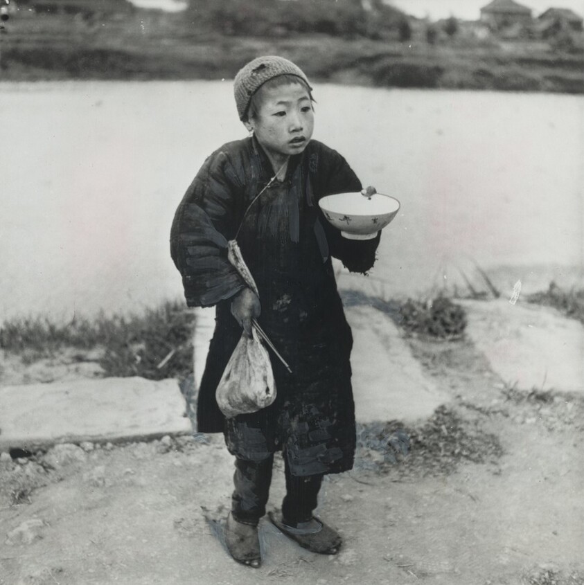 Title from caption on object: “Chinese Child Holding an Empty Rice Bowl...”