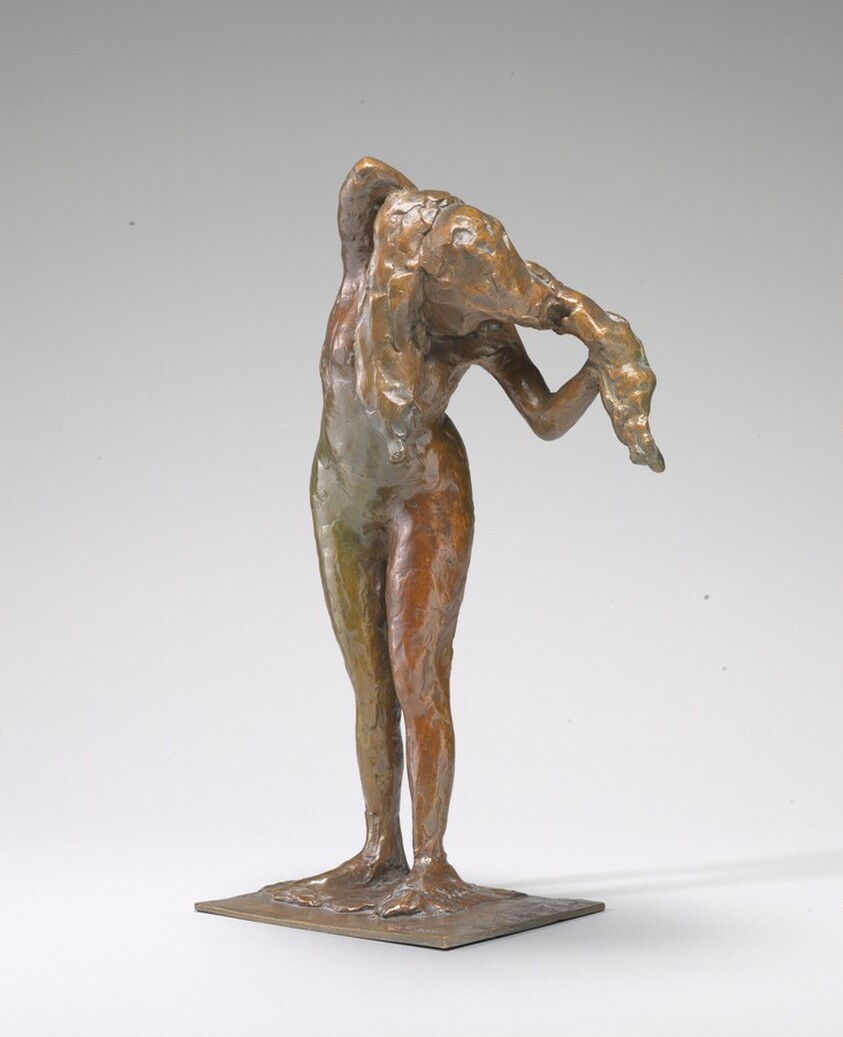 Woman Arranging Her Hair