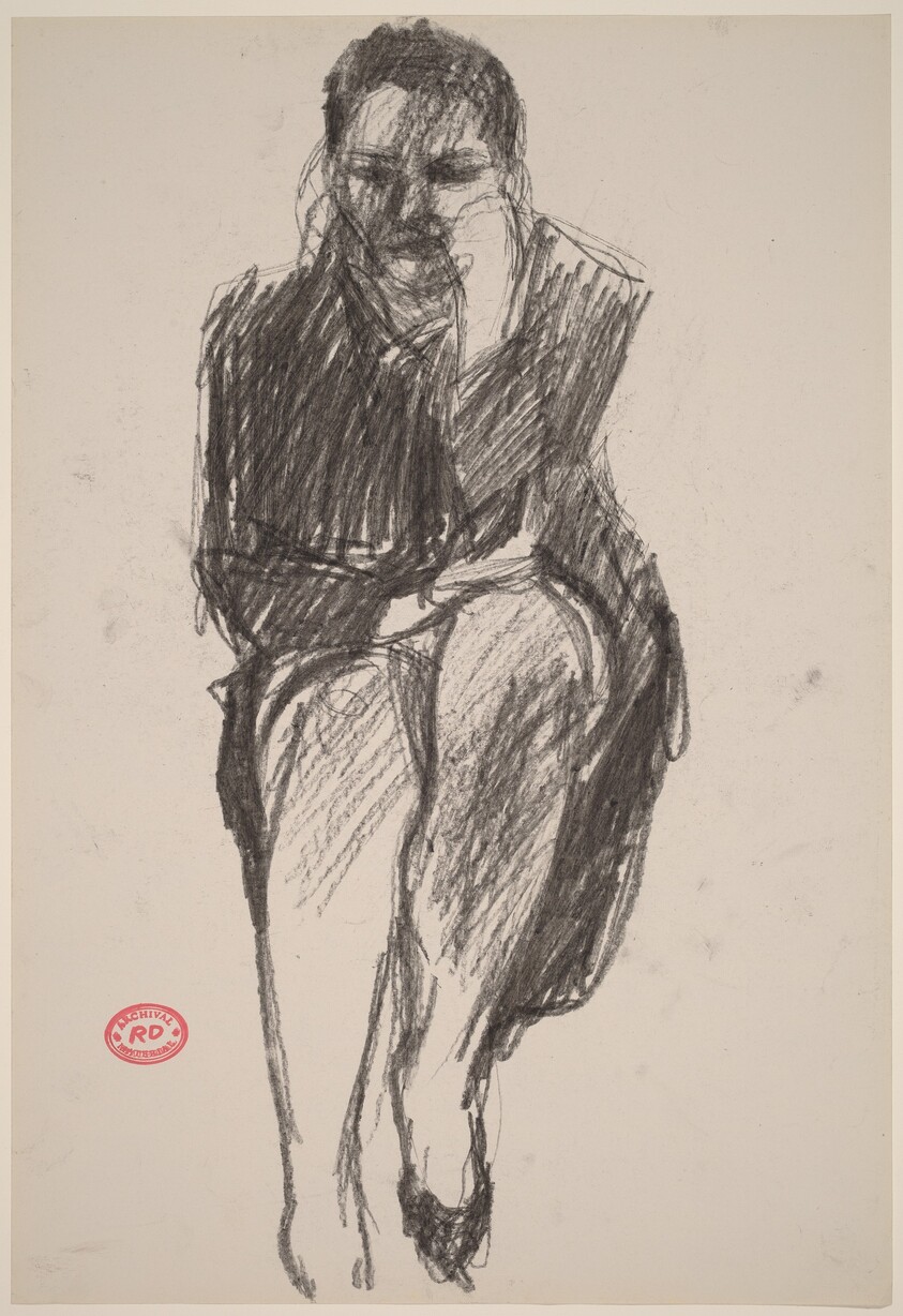 Untitled [seated woman in a dark coat]