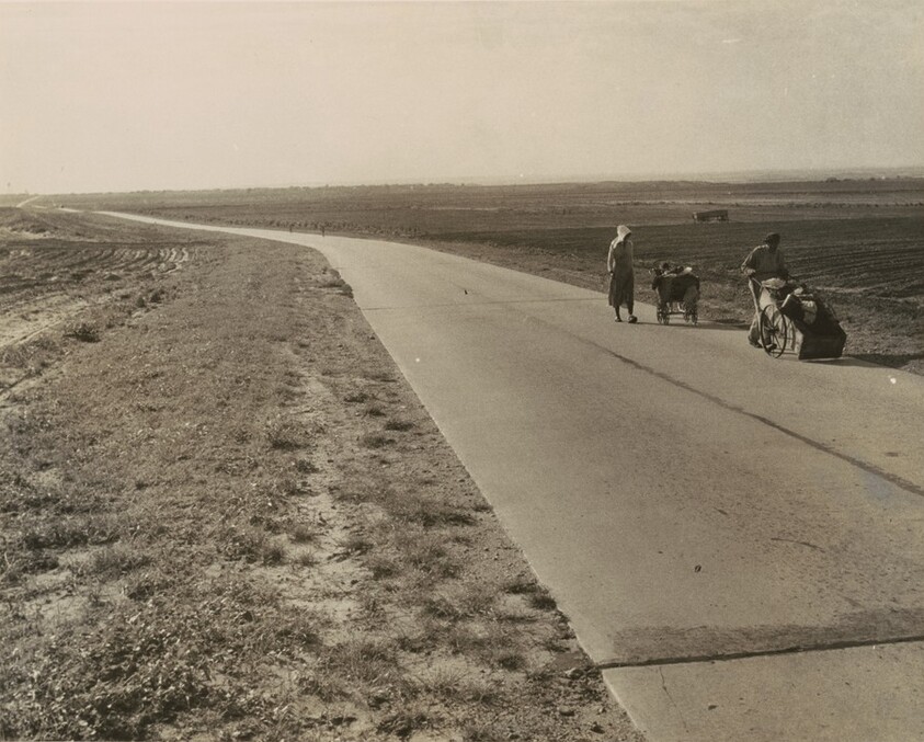 Flood refugee family near Memphis, Texas, are bound for the lower Rio Grande Valley, where they hope to pick cotton. They are from Arkansas
