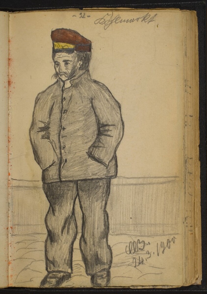 Standing Man in a Jacket and Red Hat