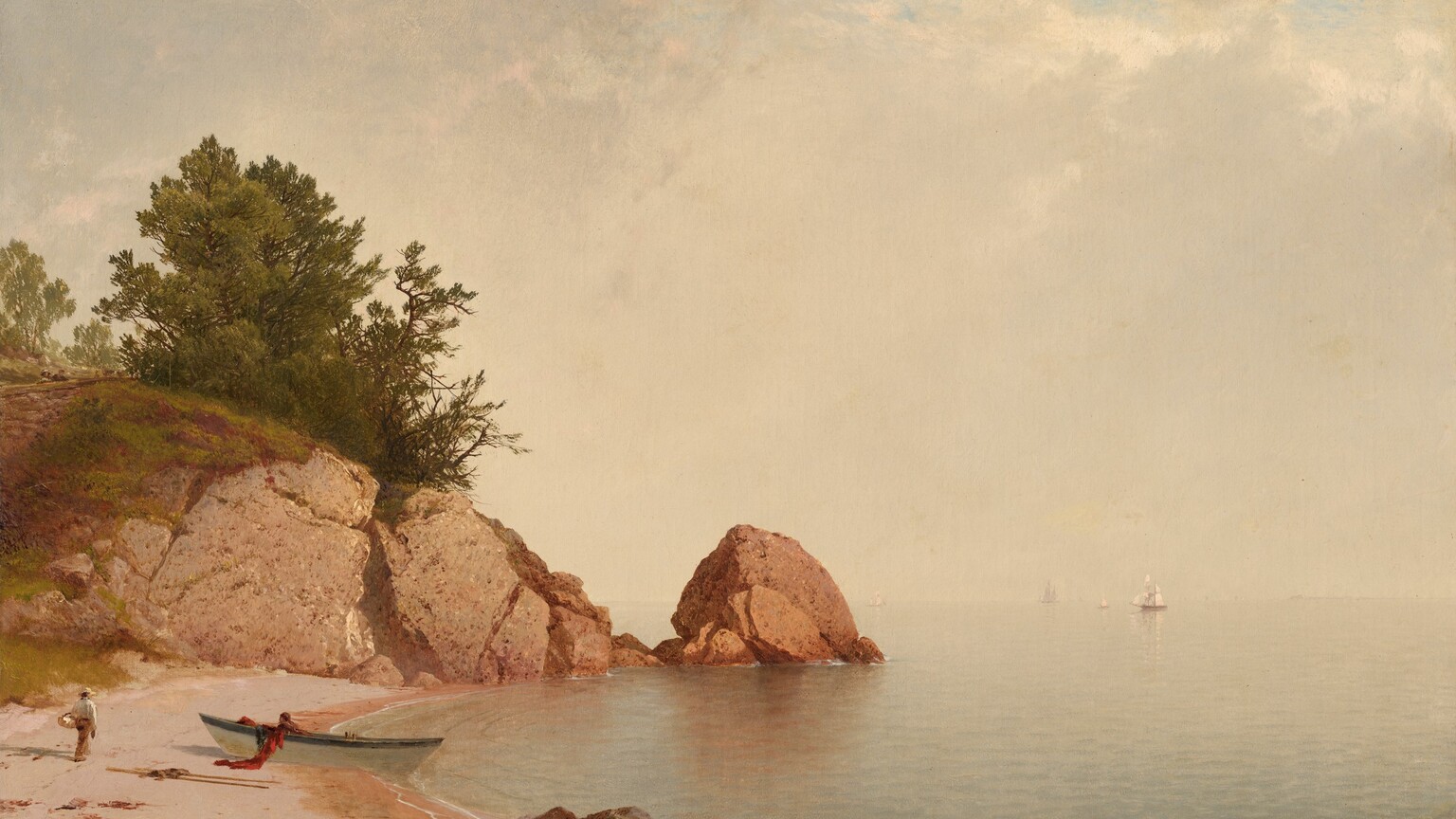 A pink-toned sandy beach meets a placid body of pale blue water under a hazy sky in this horizontal landscape painting. To our left, the beach curves like a letter C to end in the near distance with a terracotta-orange rocky outcropping and a boulder, which comes halfway across the composition. Muted green trees grow atop the outcropping, and the left half is blanketed in moss or grass. A white rowboat has been pulled into the sand about halfway along the beach. One person sits or crouches inside, and a red cloth or net hangs over the side closer to us. A person wearing a straw hat, white, long-sleeved shirt, and brown pants carries a basket over one arm as they walk away from us, not far from the rowboat. The water is very light blue where it laps gently at the shore but is washed by diffuse sunlight to parchment white in the distance. The horizon, which comes a third of the way up the canvas, nearly blends into the milky white bank of clouds above. A few sailboats are near the horizon on the right half of the painting, and a few small patches of blue sky show through the clouds in the upper right corner.