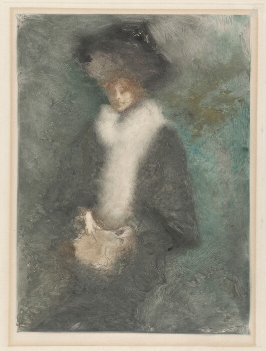 The image depicts a person sitting with an upright posture. They have light-colored hair peeking from under a large hat, wearing a dark garment with a light-colored scarf or fur wrapping around the neck. The person's hands are resting on a light-colored item. The background is a soft blur of dark and muted colors in shades of green and gray.