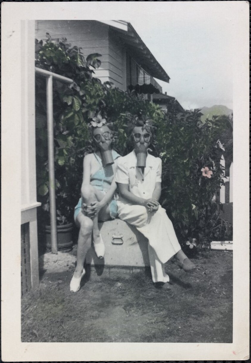 Untitled (Two women wearing gas masks)