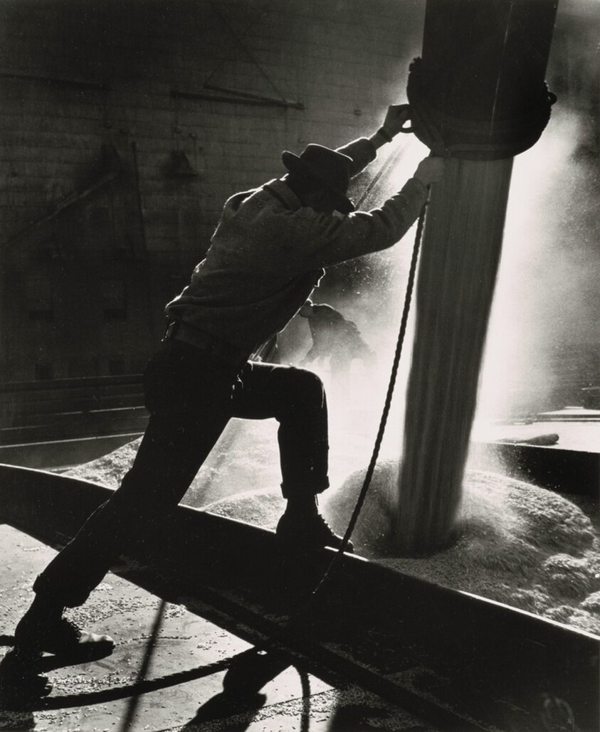 Man Loading Grain Boat