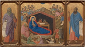 This horizontal painting is made up of three parts: in the center square panel, a woman reclines under a wooden shelter set into a rocky cave, which is surrounded by angels, and narrower wings to either side are each occupied by a standing man. All the people have pale skin, which is tinged with faint green. The three panels are joined with a gold frame, and the gold background behind the central scene and the men in the side panels are covered with a noticeable network of cracks. In the central panel, a cobalt-blue robe nearly envelopes the reclining woman’s body; this is Mary. It covers her head and falls open where she crosses her wrists over her chest to show a pink garment underneath. A flat gold halo encircles her head ,and her body is surrounded by a field of crimson red, almost like an aura. She rests under a wooden structure with a pitched roof, which is surrounded by craggy, barren rock. A swaddled infant lies in a rectangular, tray-like manger. The infant’s head is also surrounded by a gold halo. Fine gold rays emanate down into the structure from a star just above the peak of the roof. A bull and a donkey look down at the baby from the far side of the manger. The interior of the structure behind them is black. In a smaller scale, two women wash a haloed infant in a tub in front of the rocky cave near the lower left corner of this panel. A man with a white beard and hair sits to our left of Mary, holding a pink cloak at his throat and looking toward the infant. Above and around the rocks, seven winged and haloed angels cluster on each side. One angel to the right presents a scroll with black writing to two men accompanied by a dog and several sheep in the lower right. The man in the panel to the left, Isaiah, has a gray beard and long, wavy hair, and he wears a lilac-purple cloak draped over a coral-orange robe. In his right hand, on our left, he holds an unfurled scroll with large black lettering. His other hand is raised with one finger pointing upward. He looks to our left, away from the central scene. On the right, Ezekiel, echoes Isaiah's pose. Ezekiel holds an open scroll with his left hand, on our right, and his other hand is raised. He also wears a coral-colored robe, but his is overlaid with a blue cloak. His receding hair is short and brown, as is his beard. Like Isaiah, he takes up most of the height of the panel and gazes to our left, toward the central panel.