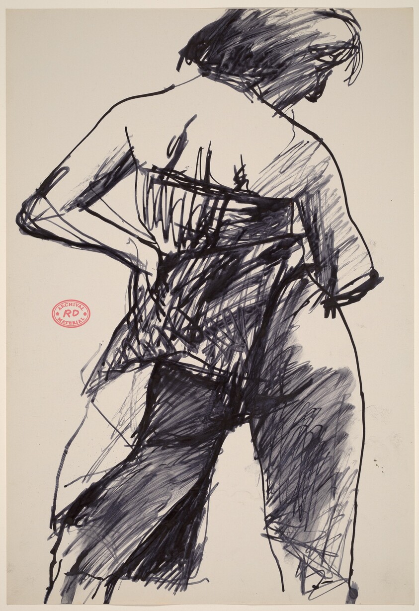 Untitled [back view of female model with hand on hip]