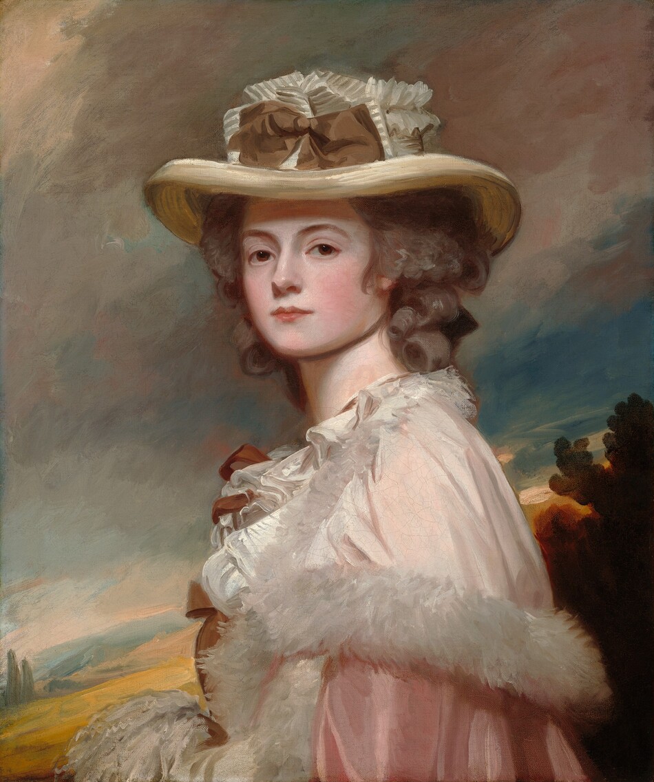Shown from the waist up in front of a loosely painted landscape, a young woman with pale skin, flushed cheeks, and light brown hair curling softly around her face and neck turns her head to look at us from over her shoulder in this vertical portrait painting. Her body faces our left in profile, and she looks at us with dark brown eyes under arched brows. She has smooth, round cheeks, and her pink lips are closed. She wears a wide brimmed ivory-white, straw hat that casts a shadow across her forehead. At the front of the crown, a tawny-brown bow is set against a ribbon striped with dove gray and white. A sheer, white cape edged with feathers or fur drapes over the shoulders of her rose-pink, satin dress. Ruffles along her chest appear to be tied with fawn-brown bows. A white, textured area near the bottom edge of the canvas suggests that her hands are clasped in front of her waist in a muff. Behind her, a harvest-gold hillside rises to a band of pine-green trees along the right edge of the composition. Filling most of the background, the opalescent sky has pewter-gray clouds angling across a pale blue sky.