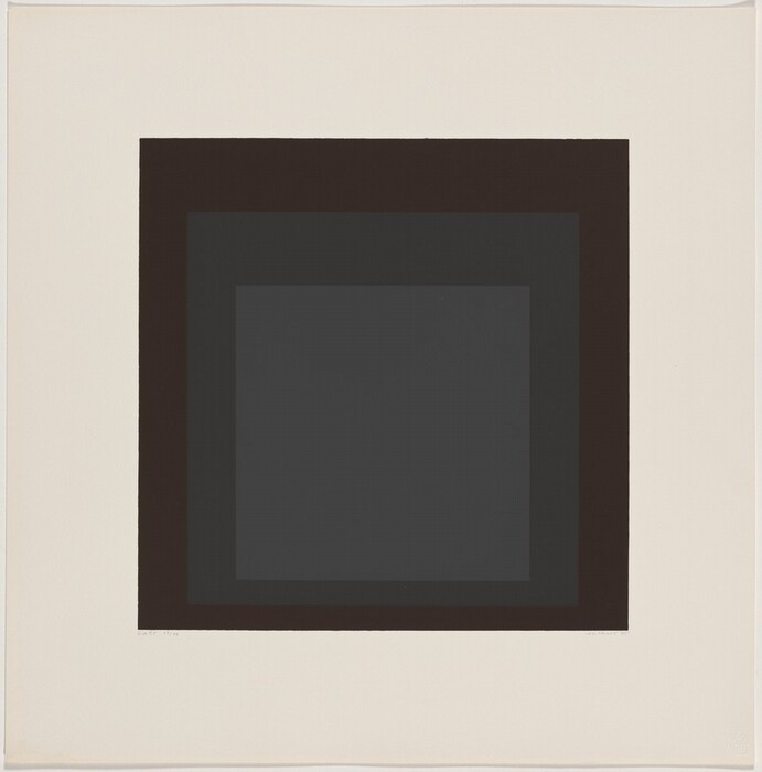 The image shows concentric squares in varying shades of black, creating a bold geometric pattern.