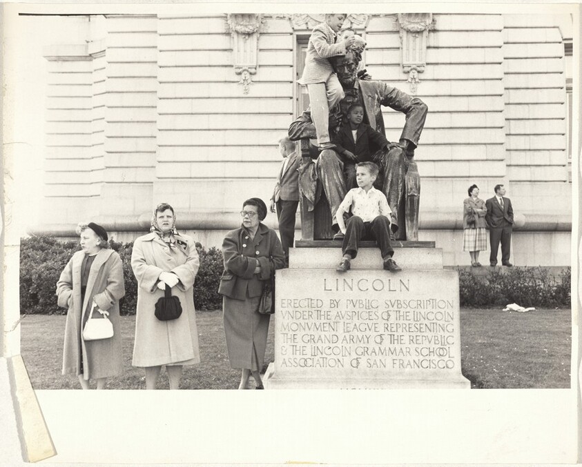 Children on Lincoln statue, parade--San Francisco