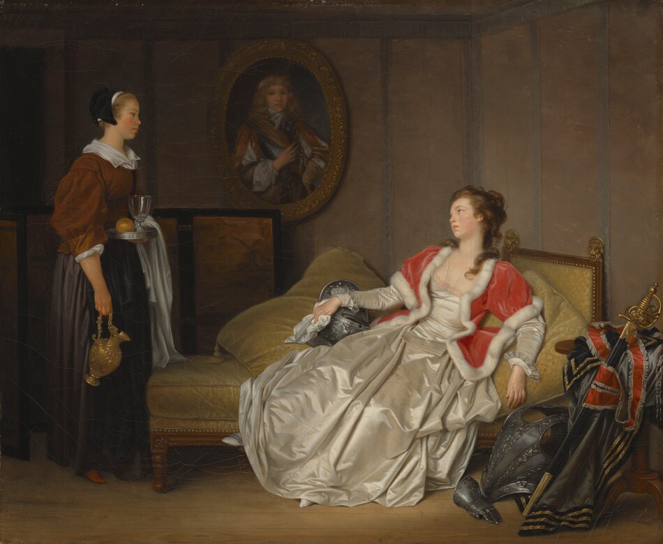 The image shows a woman seated on a chair in a luxurious environment. She has fair skin, delicate features, and wavy light brown hair styled in a partial updo. She wears an elegant cream gown with a red overcoat lined in white fur. A maid holds a tray with a glass, a small loaf, and a gold pitcher, while the woman holds a silver platter. Next to the woman, there are ornate armor and weapons on the floor. A painting of a man in historical attire hangs on the wall. The room features wooden paneling and elegant furnishings.