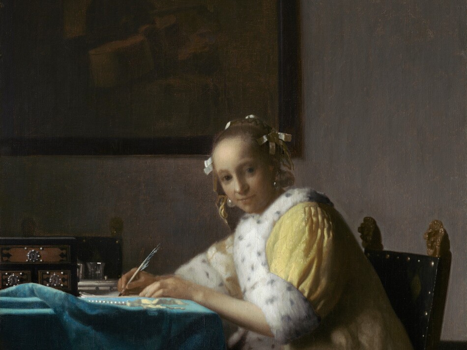 Shown from about the knees up, a pale, smooth-skinned woman in a fur-lined yellow jacket looks out at us as she sits writing at a table in this vertical painting. The woman’s body faces the table to our left. She turns her head to gaze at us from the corners of her dark gray eyes under faint brows. She has a wide nose, and her pale lips are closed. Her light brown hair is pulled back and held in place with white bows, and gleaming teardrop-shaped pearl earrings dangle from her ears. Her lemon-yellow jacket is trimmed with ermine fur, which is white with black speckles, at the cuffs and down the front opening. A full, elephant-gray skirt falls to the floor beneath the jacket. Both hands rest on the table, and she holds a quill in her right hand, farther from us, on a piece of paper. She leans forward in her wooden chair. The back panel of the chair is covered in black fabric and lined with brass studs. Two gilded finials, carved into lions’ heads, face the woman’s back with mouths open. The table is covered with a celestial-blue cloth crumpled near the left edge of the canvas. On the table are a strand of pearls, a pale yellow ribbon, and a black box with three brown panels studded with pearls around silver keyholes. Two pewter gray vessels are visible just beyond it, in front of a second chair, which faces us. On the putty-gray wall behind the woman, a framed painting hangs in the upper left quadrant of the composition. The painting-within-the painting is done in muted tones of brown and shows a cello and other unidentifiable objects.