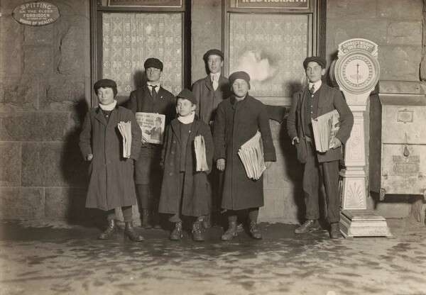8:30 P.M. Group of newsboys selling at the depot, Hartford, Connecticut. Smallest boy 11 years old.
