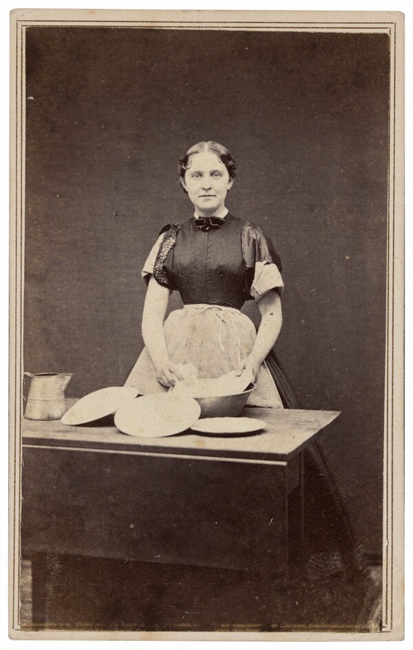 Portrait of a Woman Washing Dishes
