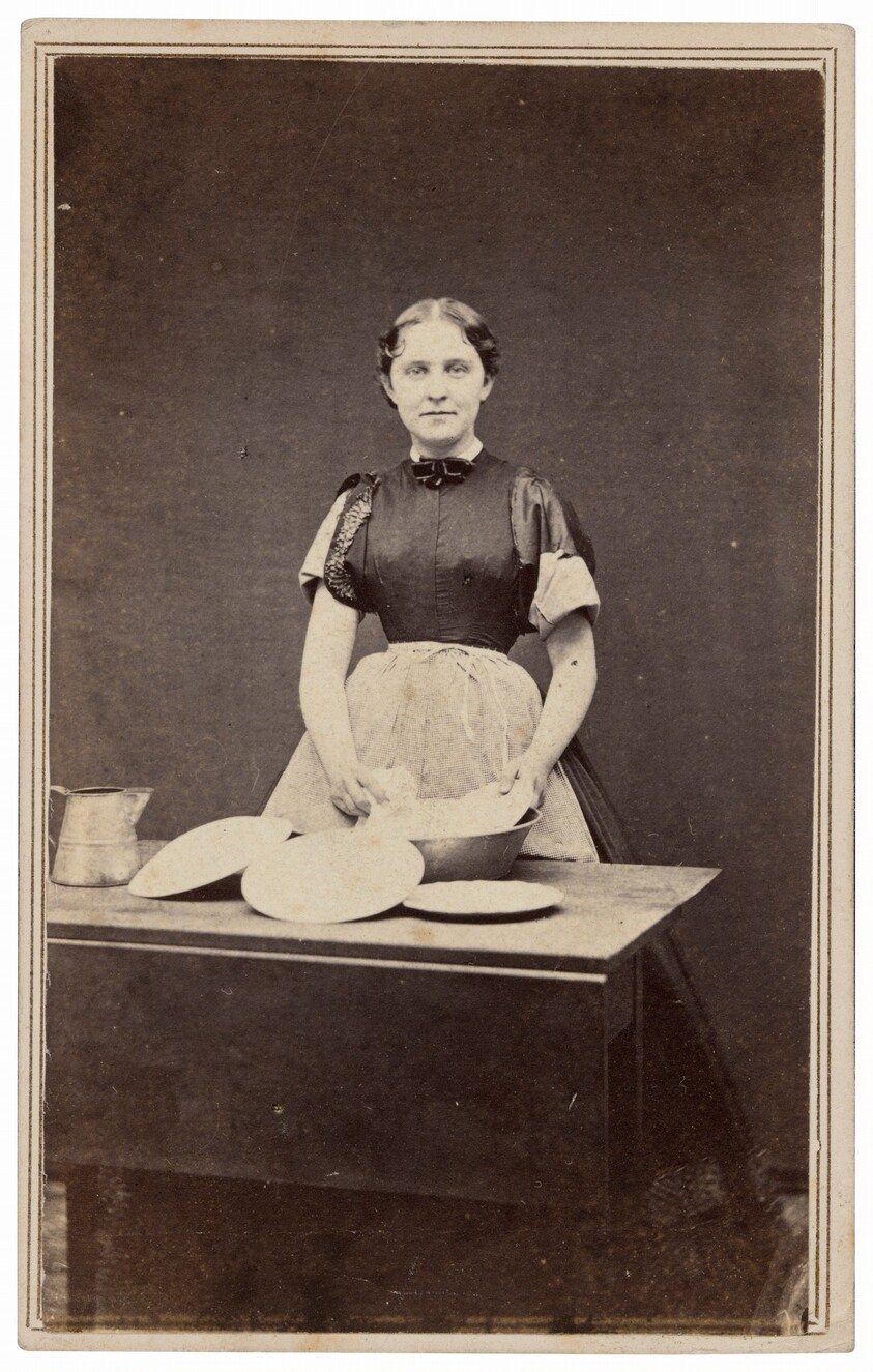 Portrait of a Woman Washing Dishes