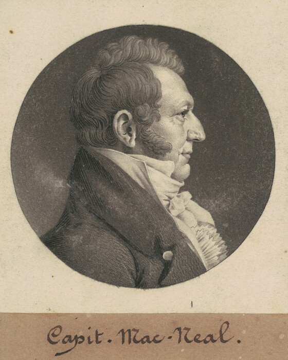 The image shows a detailed profile portrait of a person facing to the right. They have distinct facial features with a prominent nose, defined cheekbones, and sideburns connecting to curly hair. The person wears a high-collared coat with a button and a neatly arranged cravat. The background is a textured circle with lighter outer areas. Below the image, there is handwriting that reads "Capit. Mac-Neal."