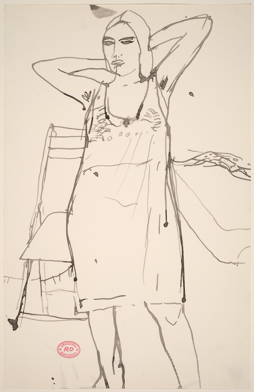 Untitled [woman standing in a negligee]