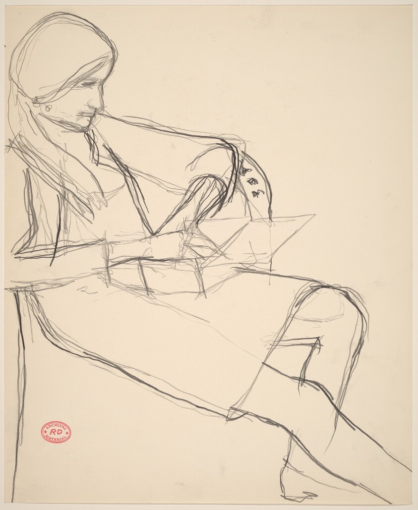 Untitled [seated woman with an open box on her lap]