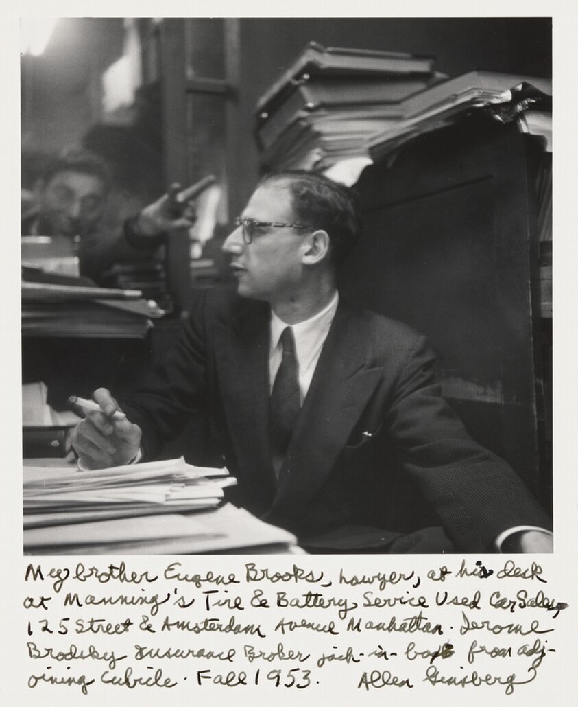 My brother Eugene Brooks, Lawyer, at his desk at Manning's Tire & Battery Service Used Car Sales, 125 Street & Amsterdam Avenue Manhattan. Jerome Brodsky Insurance Broker jack-in-box from adjoining cubicle. Fall 1953.