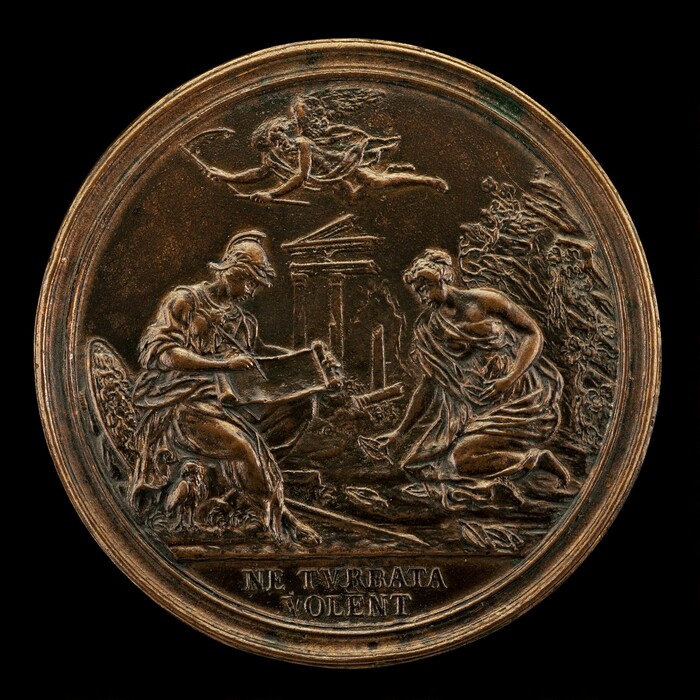 The sculpture is a circular relief medallion depicting three figures in an intricate scene. On the left, there is a seated figure possibly depicting a female in classical attire, holding what appears to be a scroll or manuscript on her lap, and the figure is adorned with a helmet. To the right, another figure in flowing robes is kneeling, perhaps engaging in an act of offering or communication with the seated figure. Above them, a winged figure is shown flying in the sky and holding a scythe. Classical architecture is seen in the background. The sculpture is made of dark bronze material with detailed engravings. The lower part of the medallion features an inscribed phrase in Latin, "NE TVRBATA VOLENT."