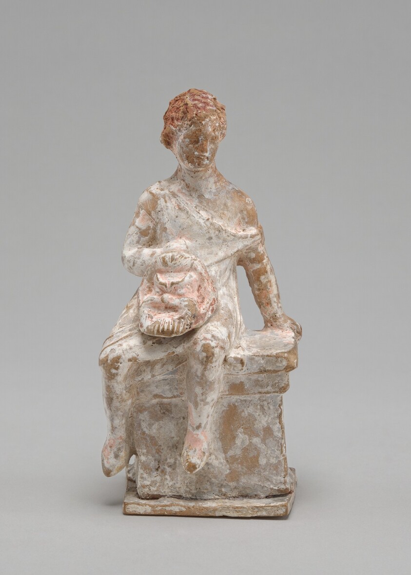 Seated Actor with Mask of Silenus