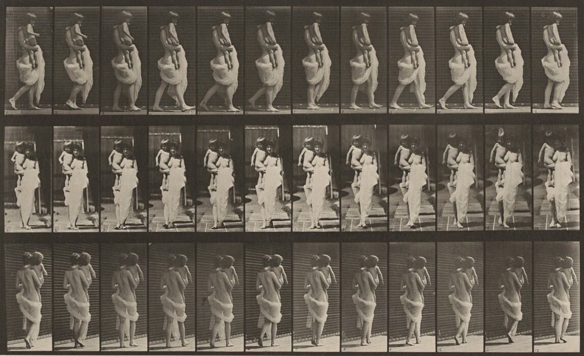 The image displays a sequential series of photographs capturing a full-body view of a woman walking while carrying a child on her back. The woman is in profile in the top and bottom rows, moving from left to right, and front-facing in the middle row. She is shown in motion, taking steps forward in each frame. Her hair is long and dark, flowing naturally. The woman is lightly draped in a sheer cloth wrapped around her waist. The child's hair is short and appears similar in color to the woman's. There are no visible accessories or objects besides the sheer cloth. The background consists of a plain, vertical grid pattern visible behind them in each frame.