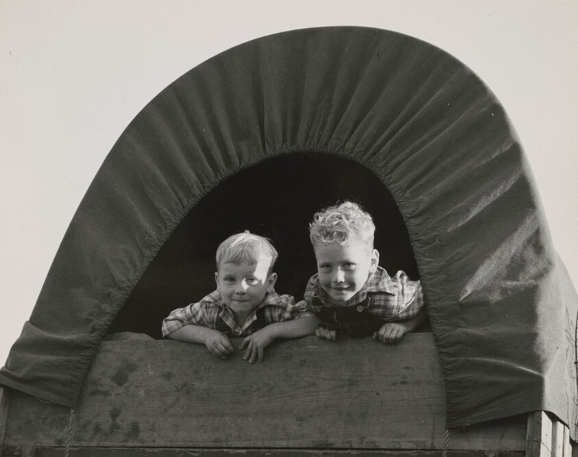 Just arrived from Kansas, on highway going to potato harvest. Near Merrill, Klamath County, Oregon
