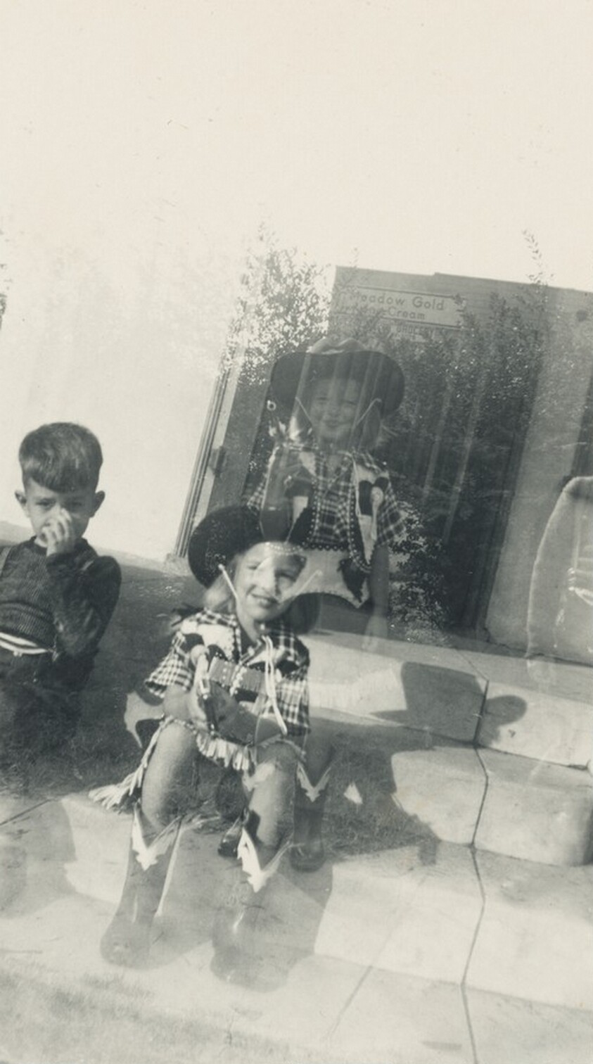 Untitled (Boy and girl wearing Western costumes)