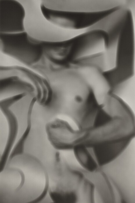 Smooth, curved lines swirl around and partially obscure a human form. The blurring of these elements creates the impression of floating ribbons or clouds wrapping around the figure, resembling a classical sculpture of a male torso. The contrast between the figure's solid form and the surrounding abstract lines offers a dynamic visual interplay, suggesting the shapes draped over the figure like flowing garments or organic forms.