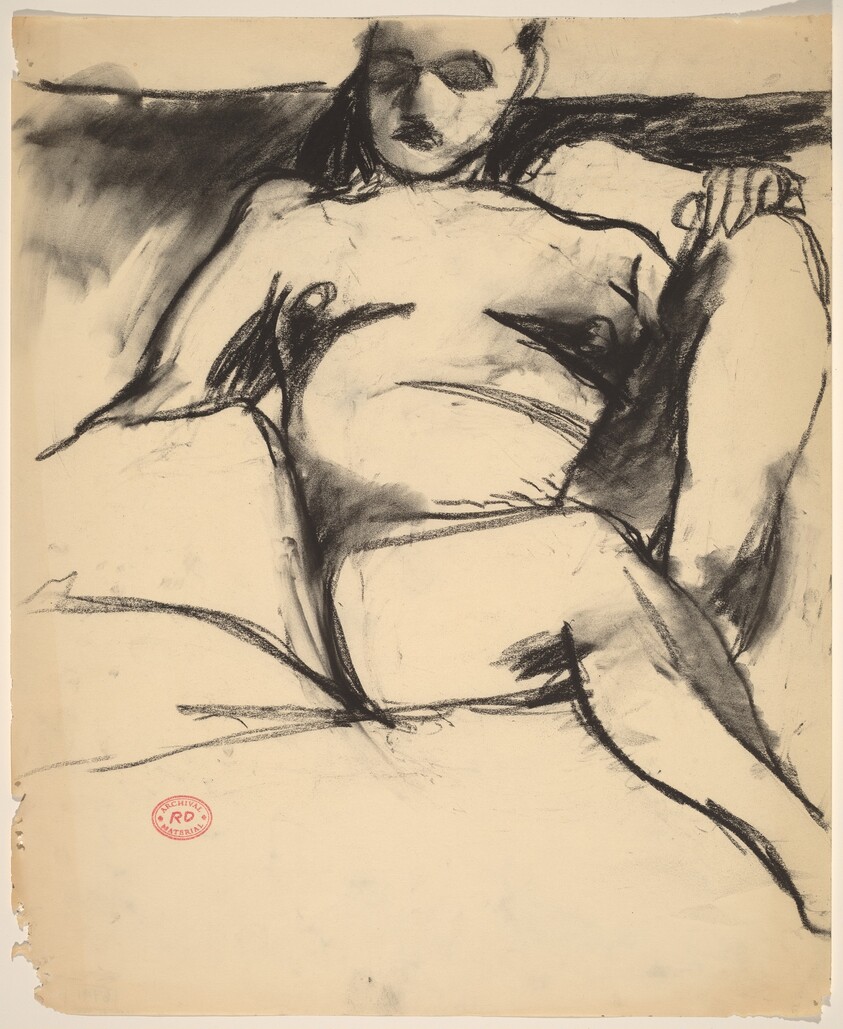 Untitled [nude seated among pillows]