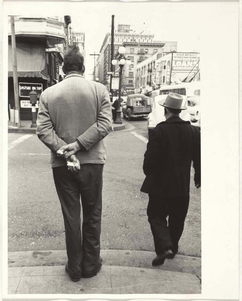 Man waiting to cross street--Los Angeles