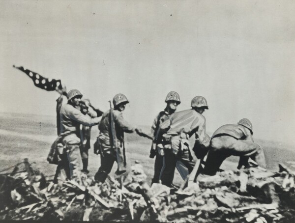 Title from caption on object: "Marine Who Made Movie of Famous Iwo Jima Flag Raising Dies in Action"