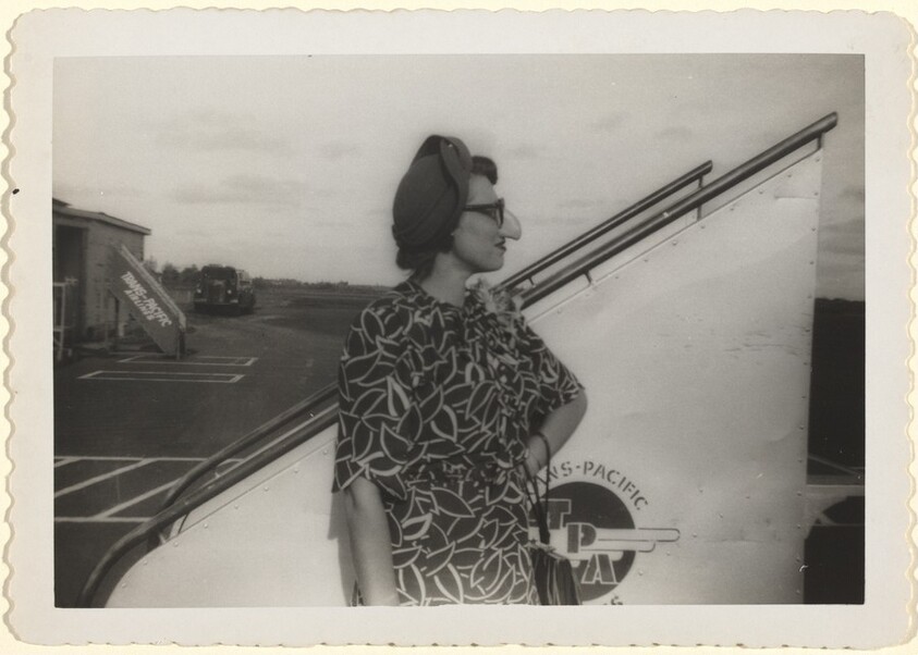 Untitled (Woman with fake nose and glasses on runway)