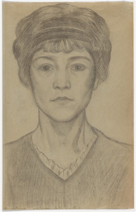 The image is a portrait drawing of a person's head, neck, and part of the shoulders. The person is facing forward with a calm expression, straight gaze, and closed lips. The hair is styled covering the ears with waves and a fringe across the forehead. The person is wearing an upper garment with a V-shaped neckline and a ruffled or pleated collar is visible under it. The background is plain. The drawing is in a soft pencil or charcoal medium, giving it a muted, monochromatic appearance.