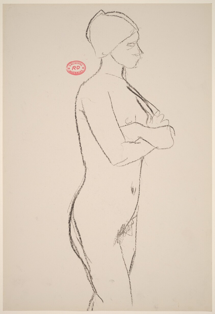 Untitled [side view of standing female nude with arms crossed]