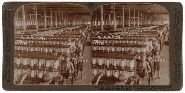 "In a Great Spinning Room (104,000 Spindles), Olympian Mills, Columbia, South Carolina"