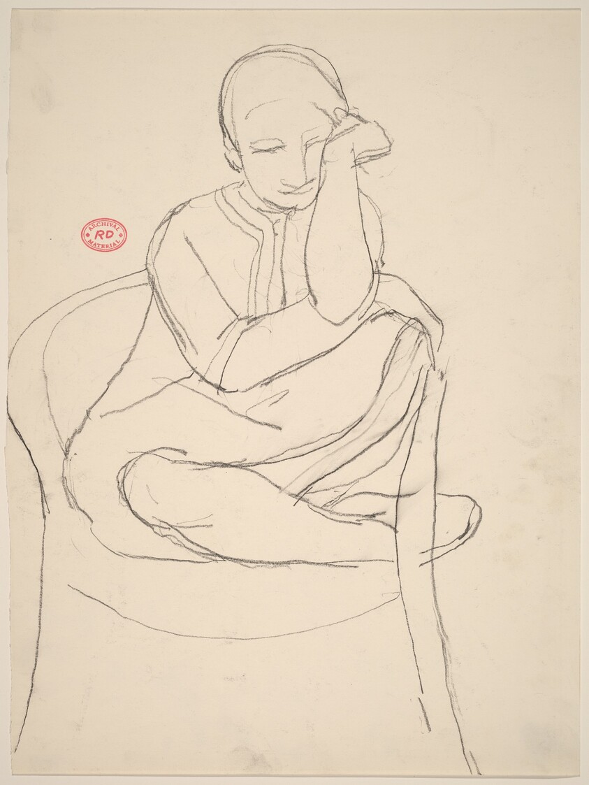 Untitled [seated woman with legs pulled into a chair]