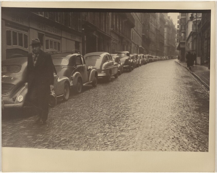 Car lined street, Paris