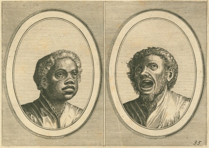 The image features two individuals depicted in oval frames, showing their upper bodies including their heads, shoulders, and part of their chests. The left individual is positioned facing slightly to the right with short, curly hair. Their facial features are well-defined with prominent eyes and lips. The person wears a garment with a visible collar. The right individual faces slightly to the left, with an open mouth. They have short, curly hair and a beard. Their garment appears similar in style to the first person, with a collar visible. Both frames are set against a lined background. The background outside the frames is plain.