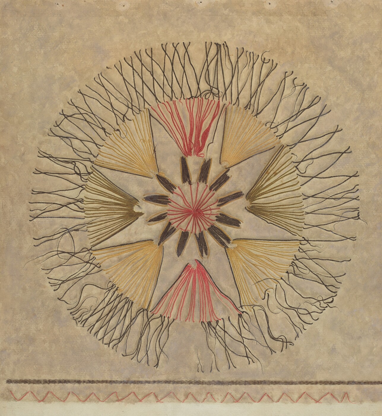 The image features a circular shape with radiating lines and symmetrical segments. The central circular element is surrounded by petal-like sections extending outward. Each segment is composed of neatly arranged lines emanating from the center. The color scheme includes red, yellow, and brown. Wavy and zigzag lines encircle the shape. A border at the bottom includes a zigzag and braided line.