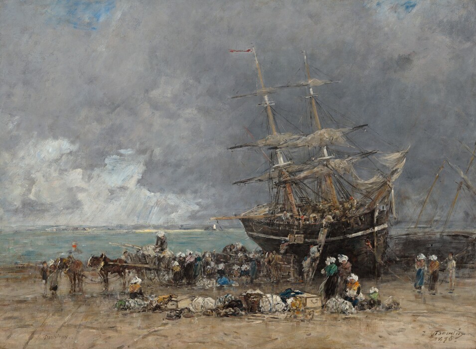 A two-masted ship with sails furled has been pulled onto a beach as dozens of people bustle on and around it in this horizontal landscape painting. The scene is loosely painted and many details are indistinct throughout. The ship dominates the right half of the composition, listing slightly to the left as the bow lodges in the sand. People working on the deck pass crates and goods down to others standing on a ladder or horse-drawn carriage pulled up alongside the hull. The women wear long brown, gray, or dark blue skirts, shawls in shades of golden yellow, marigold orange, dusky pink, or muted green, and white headdresses. The men’s clothing is earth brown and gray, and a few wear brick-red caps.  Three women and perhaps a child sit or stand to or right next to a line of goods in bundles, baskets, and crates that separate us from the line of activity closer to the shore. The horizon comes about a third of the way up the composition, and the ship’s masts thrust into a sky nearly filled with slate-gray clouds. A couple patches of vivid blue line the top of the painting, and white streaks in the distance to the left suggest sunlight pouring through another break in the clouds. The artist inscribed the site in the lower left corner, “Portrieux” and signed and dated the painting in the lower right corner, “E Boudin 1875.”