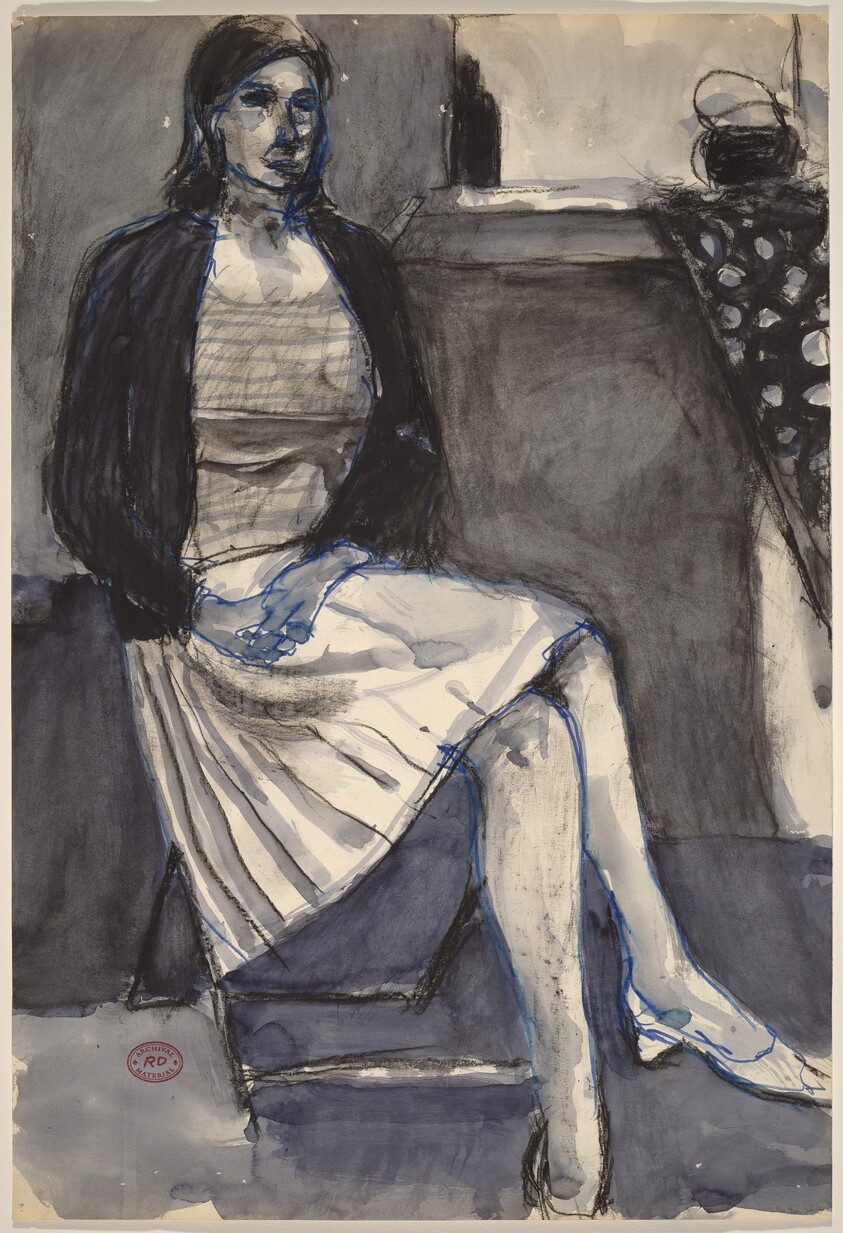 Untitled [seated woman in pleated skirt]