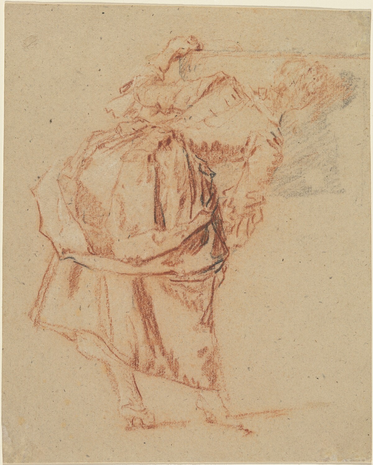 A Young Woman Looking in a Mirror