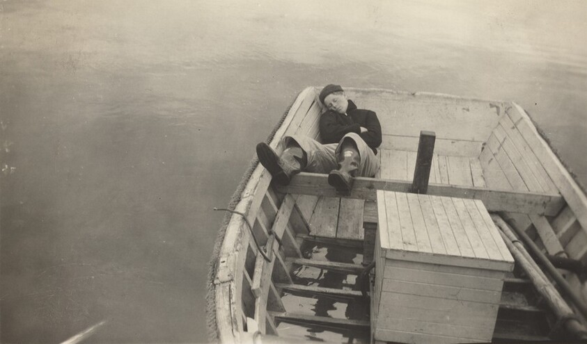 Untitled (Man asleep in rowboat)