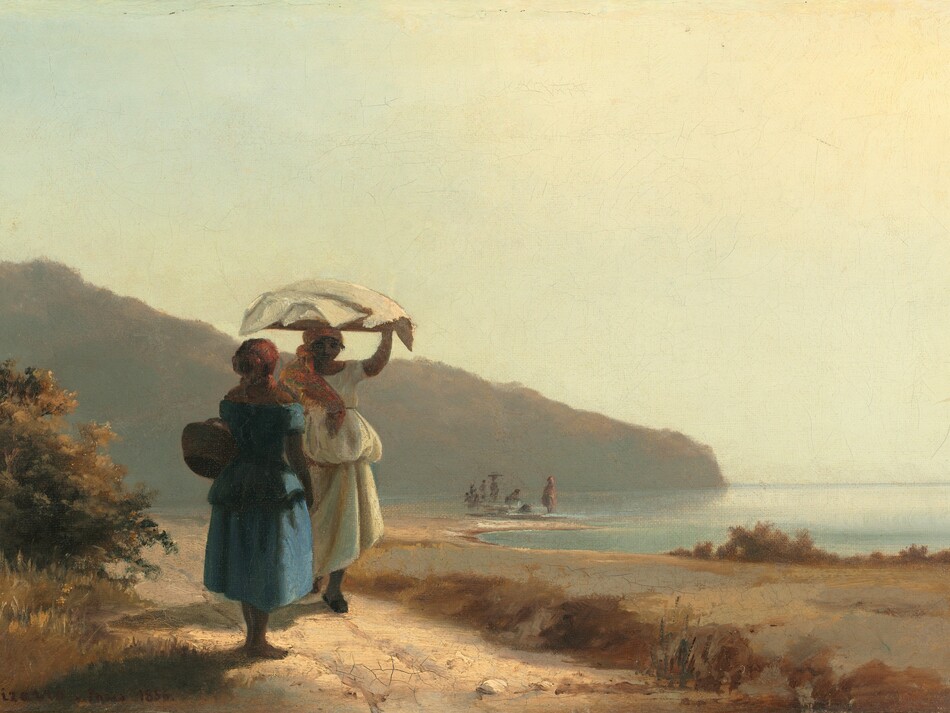 Two dark-skinned women stand facing each other on a dirt path that runs beside a body of water in this horizontal painting. One woman faces us and balances a flat tray loaded with white cloths on her head. Her left hand, on our right, holds the tray steady. The apron or loose, long skirt of her off-white dress is bunched up around her hips, but the fabric still falls to her ankles. A dark green, red, and brown scarf covering her head is tied in a knot by one ear, and the ends fall in front of that shoulder. The other woman stands in front of the first, to our left with her back to us. She wears an aquamarine-blue dress and garnet-red scarf tied around her head. A brown basket hangs from her left arm. The path angles from the lower right corner and cuts into the distance to our left. It is lined with brown and green bushes and grasses. An expanse of dirt to our right reaches to the shoreline, which curves like a C into the distance. Dabs of brown and dark pink suggest several more people standing or stooping in the surf in the distance. Shallowly sloping rust-brown hill cut into the water, spanning left two-thirds of the width of the composition along the horizon. The sky in the top half of the composition is a clear, milky white. The artist signed and dated the lower left corner, “C.Pizarro. Paris 1856.”